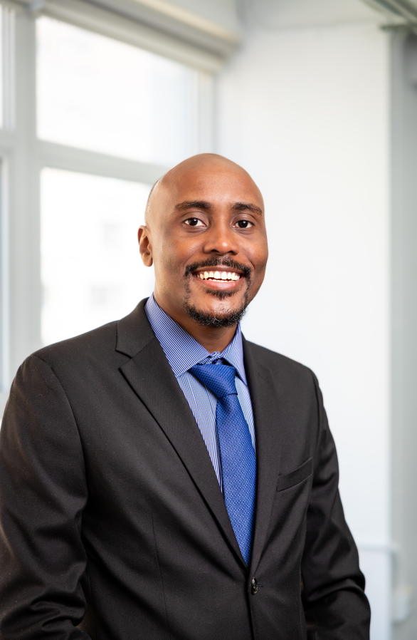 Emmanuel Olimi Kasigazi — Founder of Axam